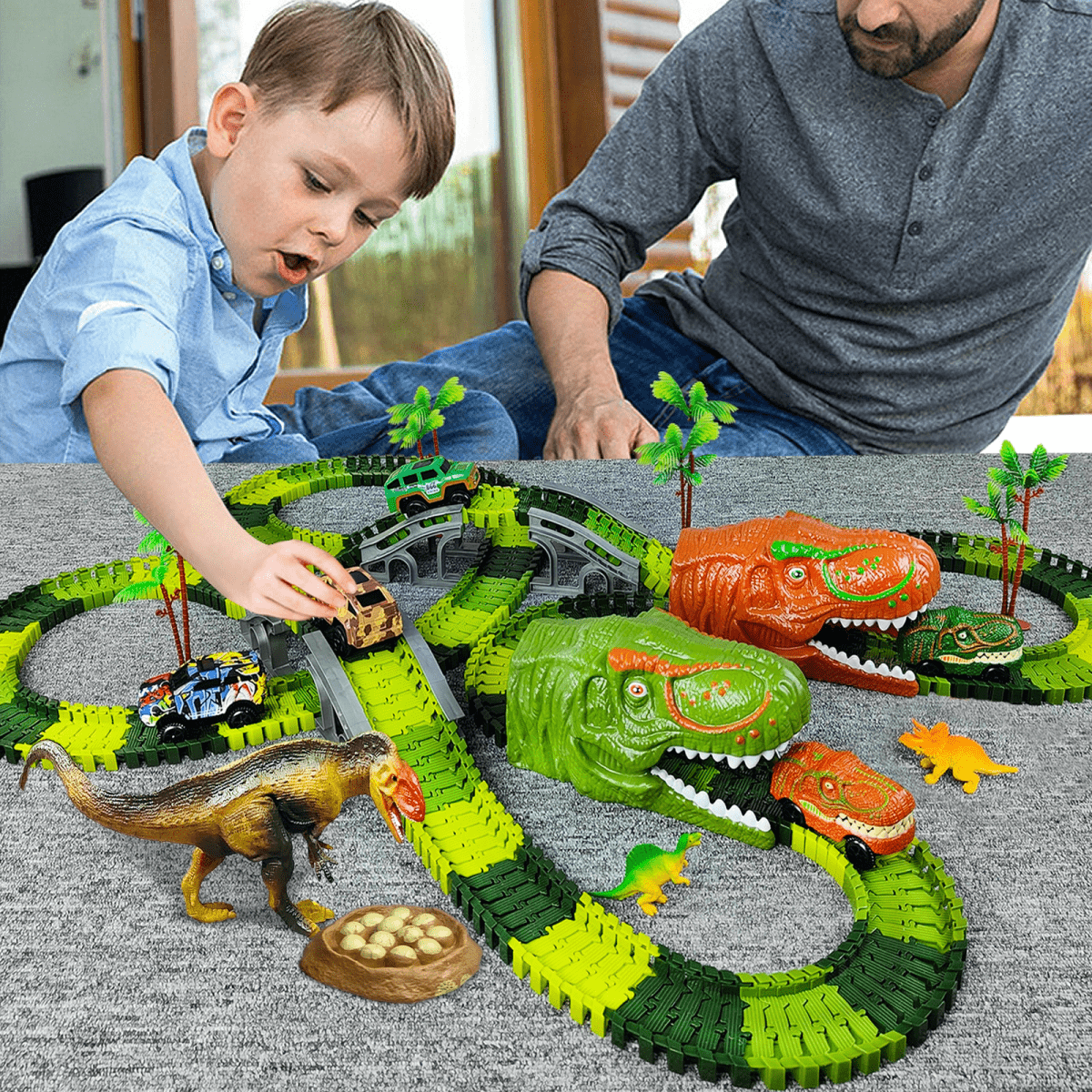 Jurassic-Track-Abenteuer-Interaktives-Dinosaurier-Zugset — Modulare Gleisstücke, schiebebetriebene Lokomotiven, ab 3 Jahren