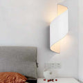 Travin Modern Conch Shape Spiral Outdoor Wall Lamp, Black/White/Gold - Neutralighting