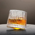 Whirluxe roterbare whiskyglass — bred, rund spinnbase