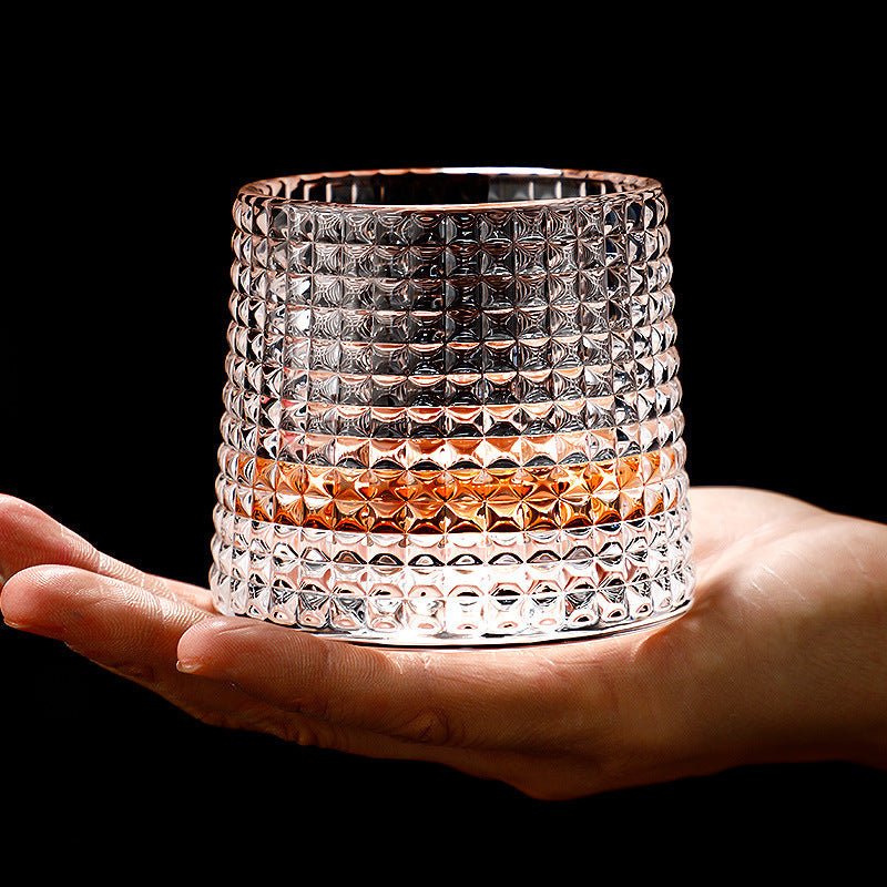 Whirluxe roterbare whiskyglass — bred, rund spinnbase