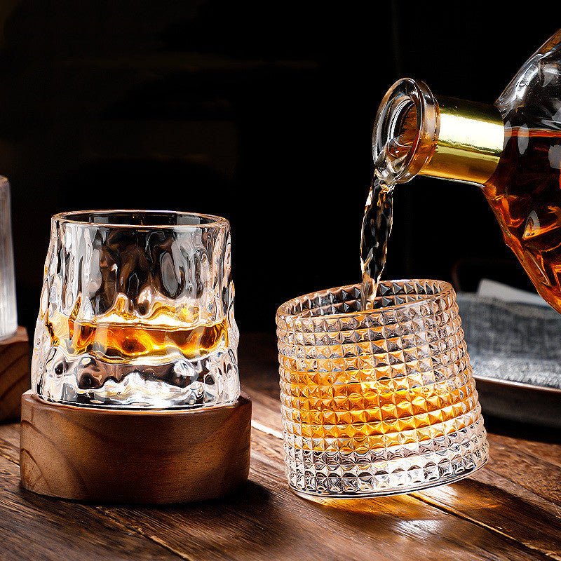 Whirluxe roterbare whiskyglass — bred, rund spinnbase