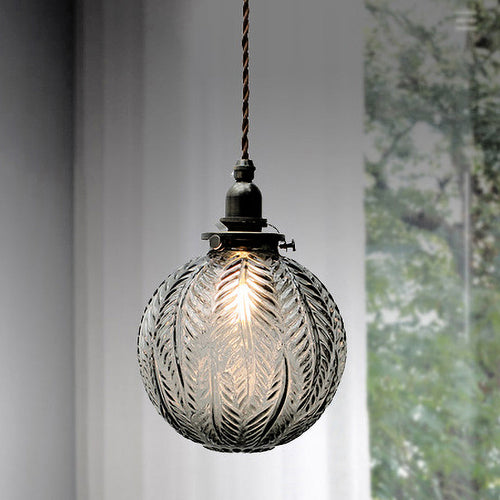 Aurea Globe Pendant Light in Colonial Style for Vintage Warmth Ambience