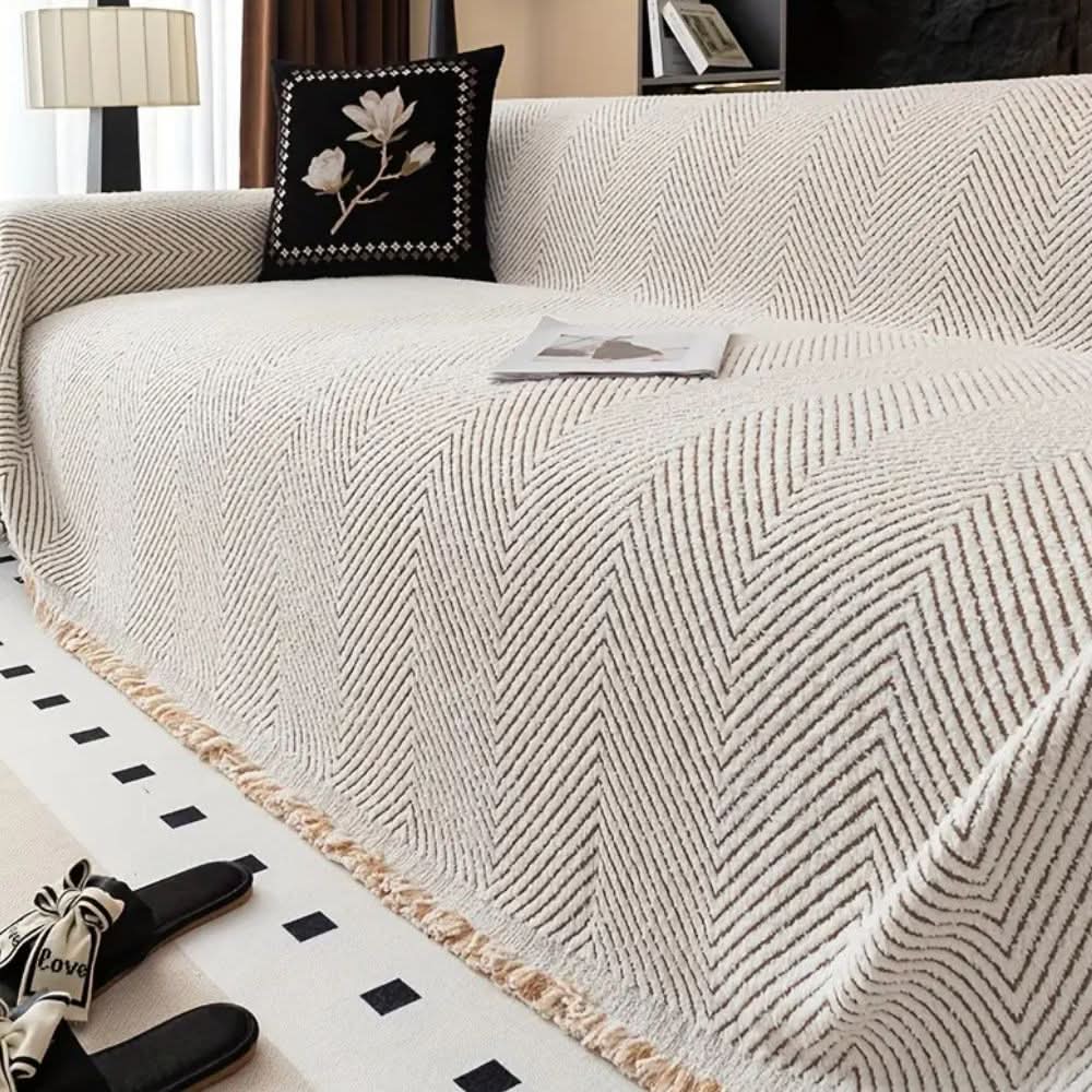 CozyShield halszálkamintás kanapéhuzat — fröccsenésálló, csúszásgátló