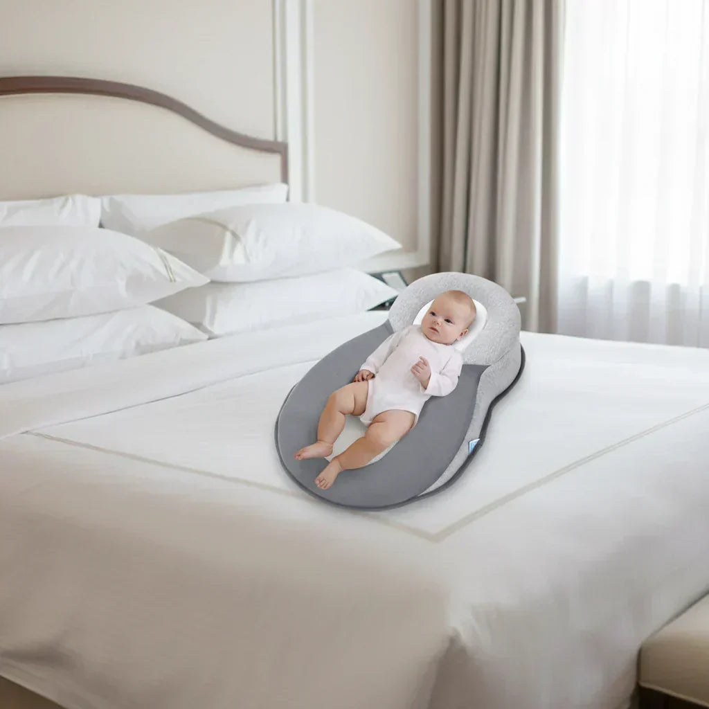 NurtureNest Ergonomic Baby Pillow — Curved Profile Positioning Cushion