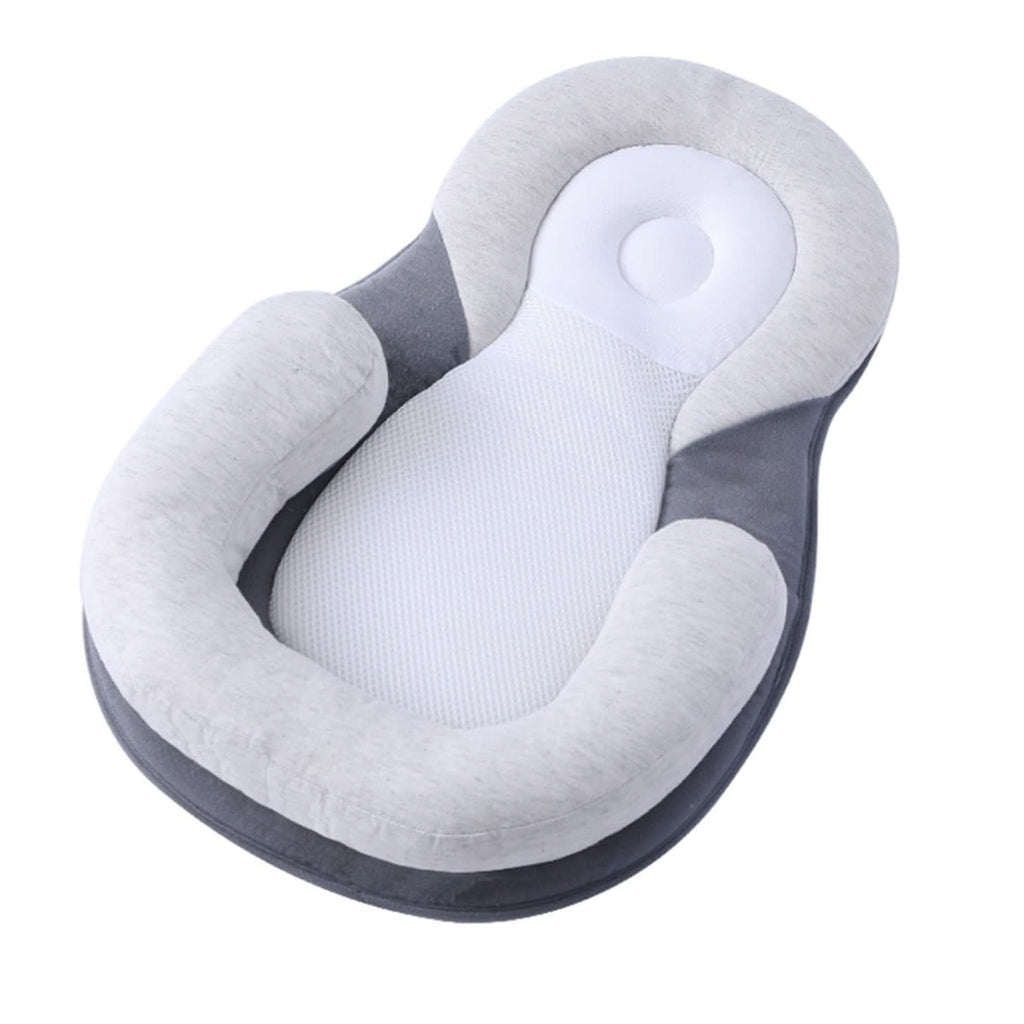 NurtureNest Ergonomic Baby Pillow — Curved Profile Positioning Cushion