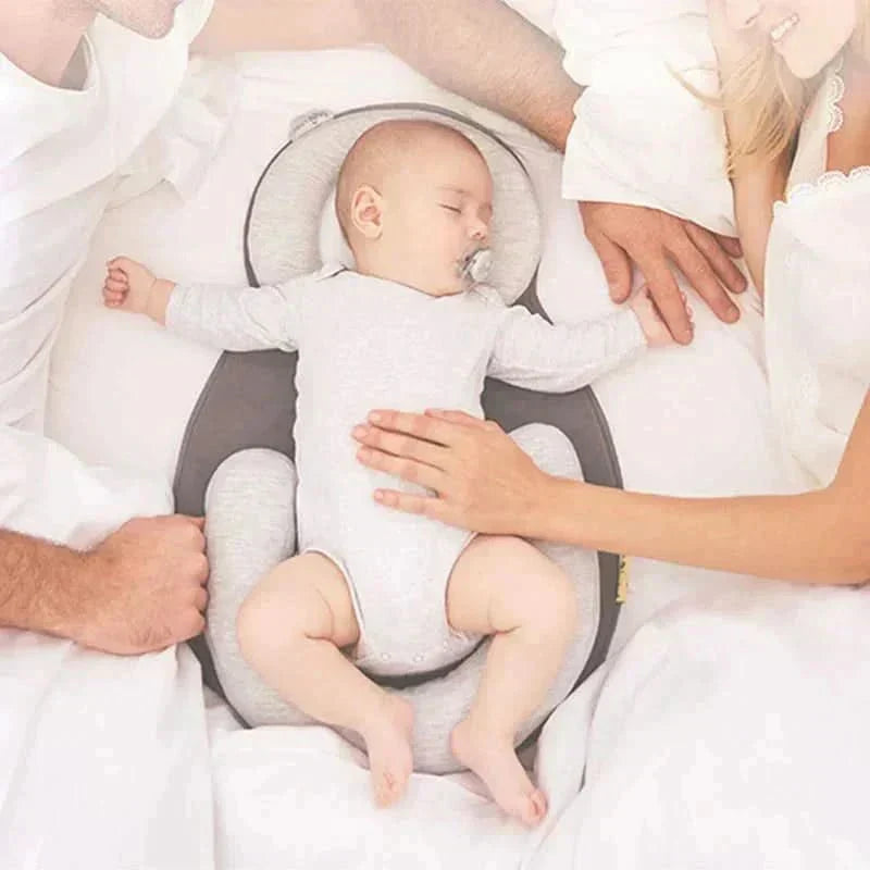 NurtureNest Ergonomic Baby Pillow — Curved Profile Positioning Cushion