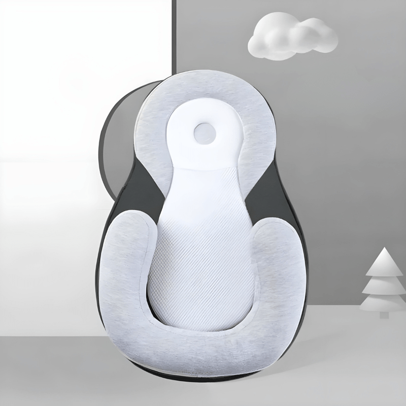 NurtureNest Ergonomic Baby Pillow — Curved Profile Positioning Cushion