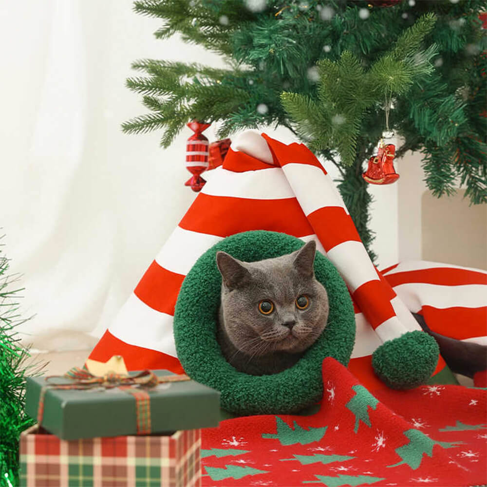 HolidayHaven weiches Weihnachtsbett für Katzen – geschwungene Silhouette, zugluftgeschützte Ränder