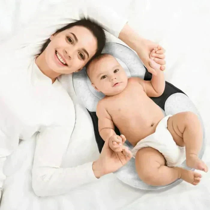 NurtureNest Ergonomic Baby Pillow — Curved Profile Positioning Cushion