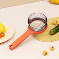 Stainless Steel Peeler with Integrated Peel Collection Container