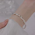 Elegant Twisted Silver Bracelet | ventumra