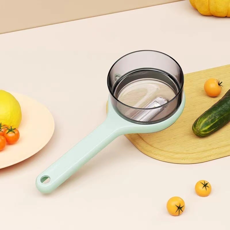 Stainless Steel Peeler with Integrated Peel Collection Container