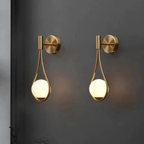 SolaraDrop Nordic Golden Lamp with Modern Droplet Design