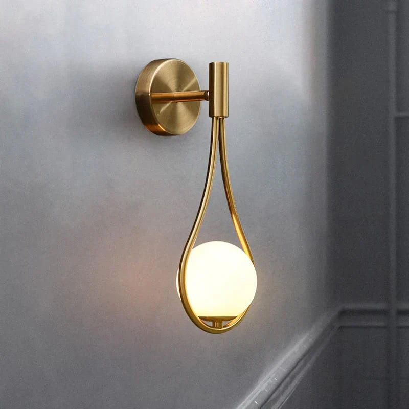 SolaraDrop Nordic Golden Lamp with Modern Droplet Design