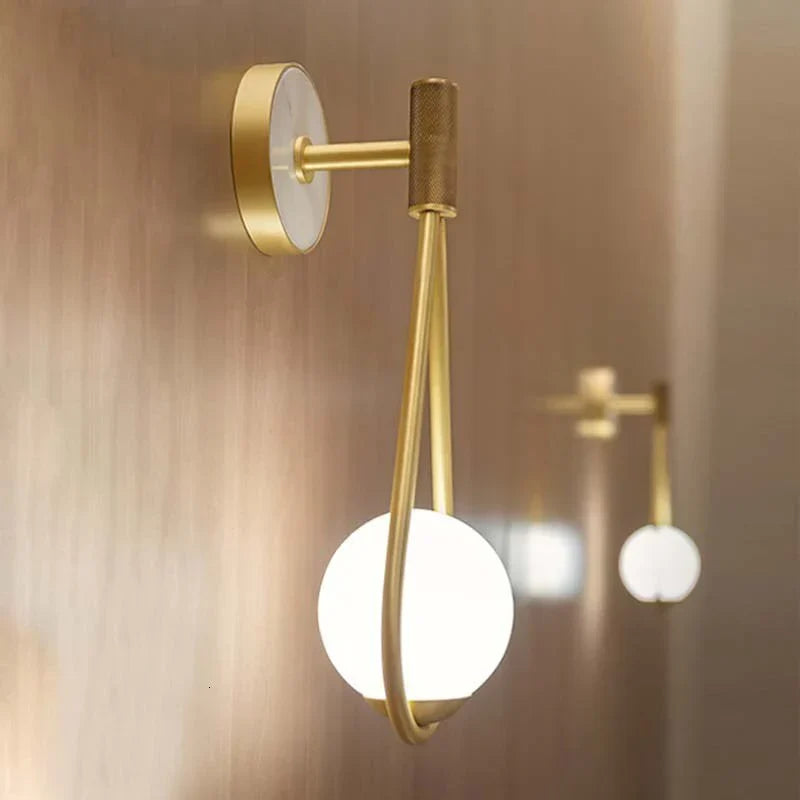 SolaraDrop Nordic Golden Lamp with Modern Droplet Design