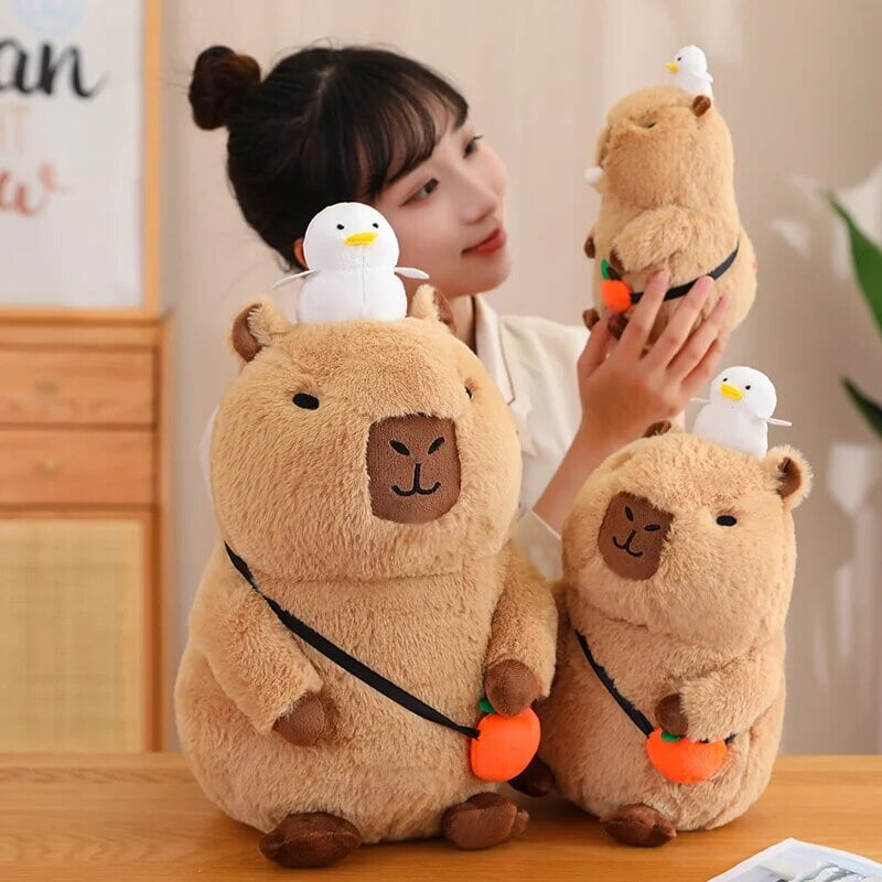 Fluffy Sleepy Capybara with Orange Plushie | ventumra