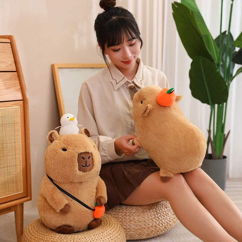 Fluffy Sleepy Capybara with Orange Plushie | ventumra