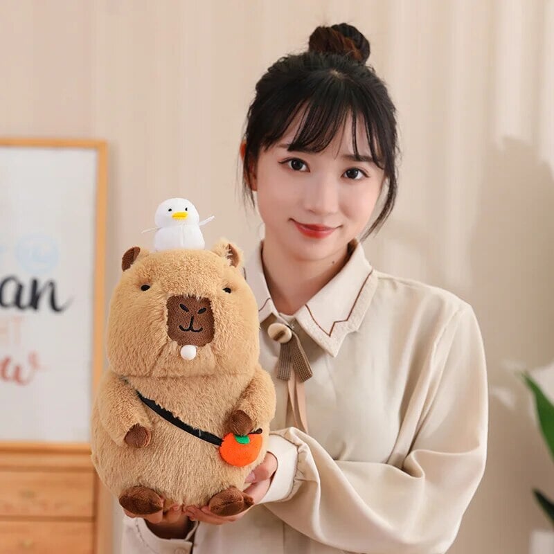 Fluffy Sleepy Capybara with Orange Plushie | ventumra