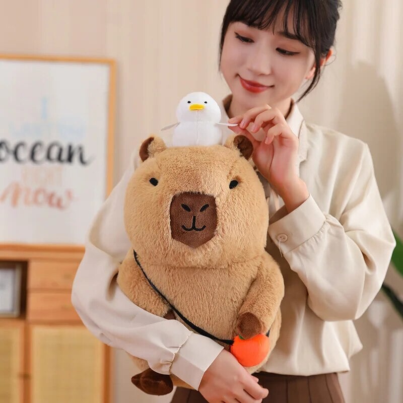 Fluffy Sleepy Capybara with Orange Plushie | ventumra