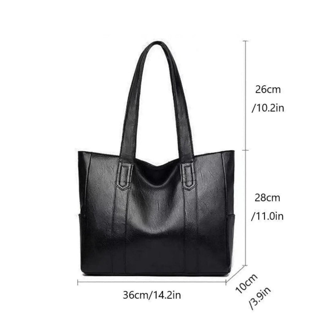 Elegant leather shoulder bag with a retro touch and smooth surface | ventumra